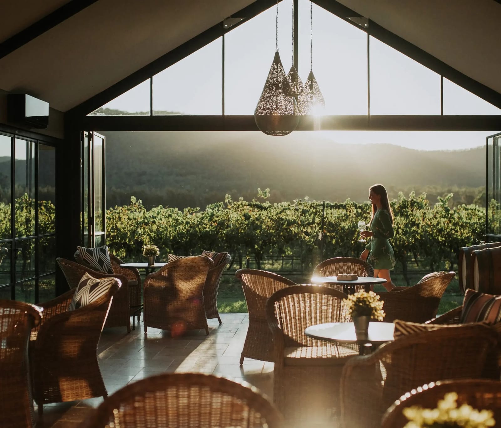 Cellar door lounge with vineyard views through floor-to-ceiling windows