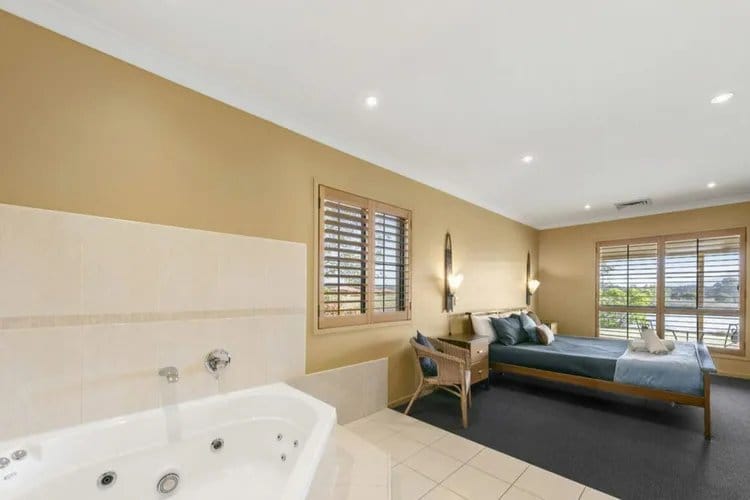 Open-plan kitchen and lounge inside one of the estate villas