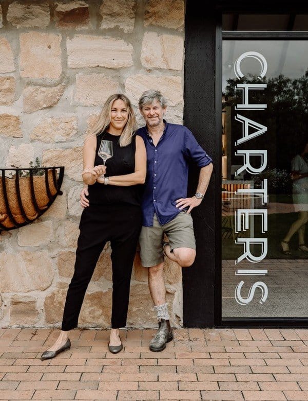 Stone cellar door entrance with Charteris signage