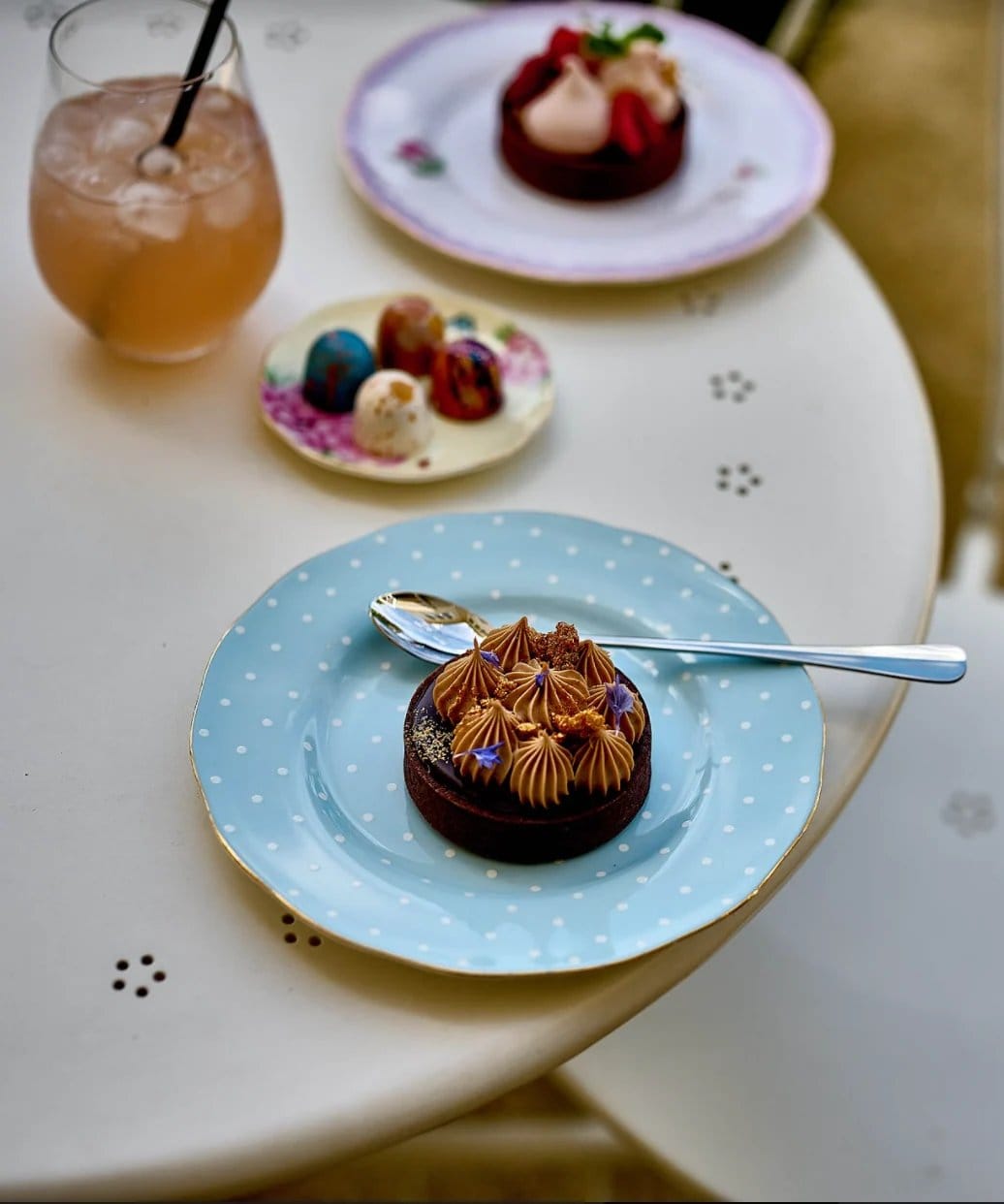 Chocolate tarts and bonbons on a cafe table at Cocoa Nib, Pokolbin, Hunter Valley