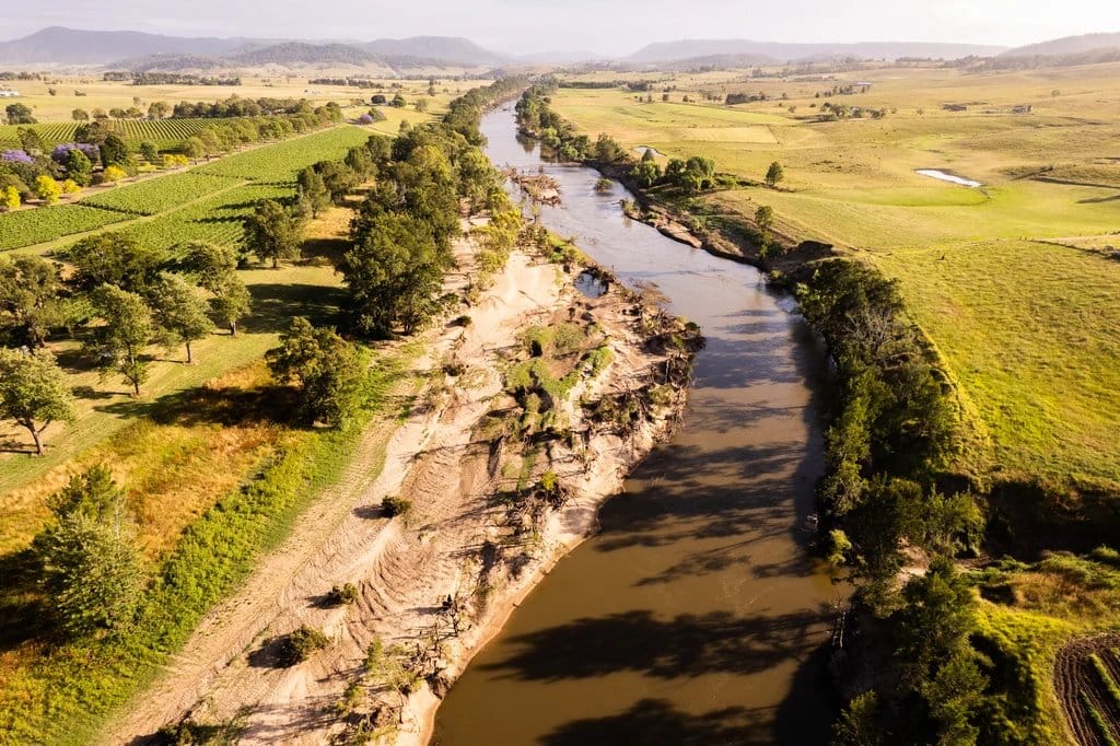 Aerial landscape showing river, vineyards and rolling countryside
