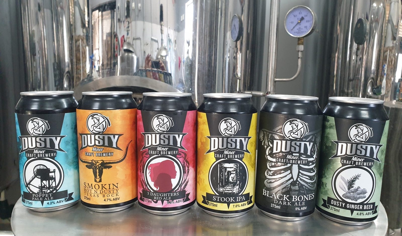Dusty Miner Craft Brewery beer cans on display