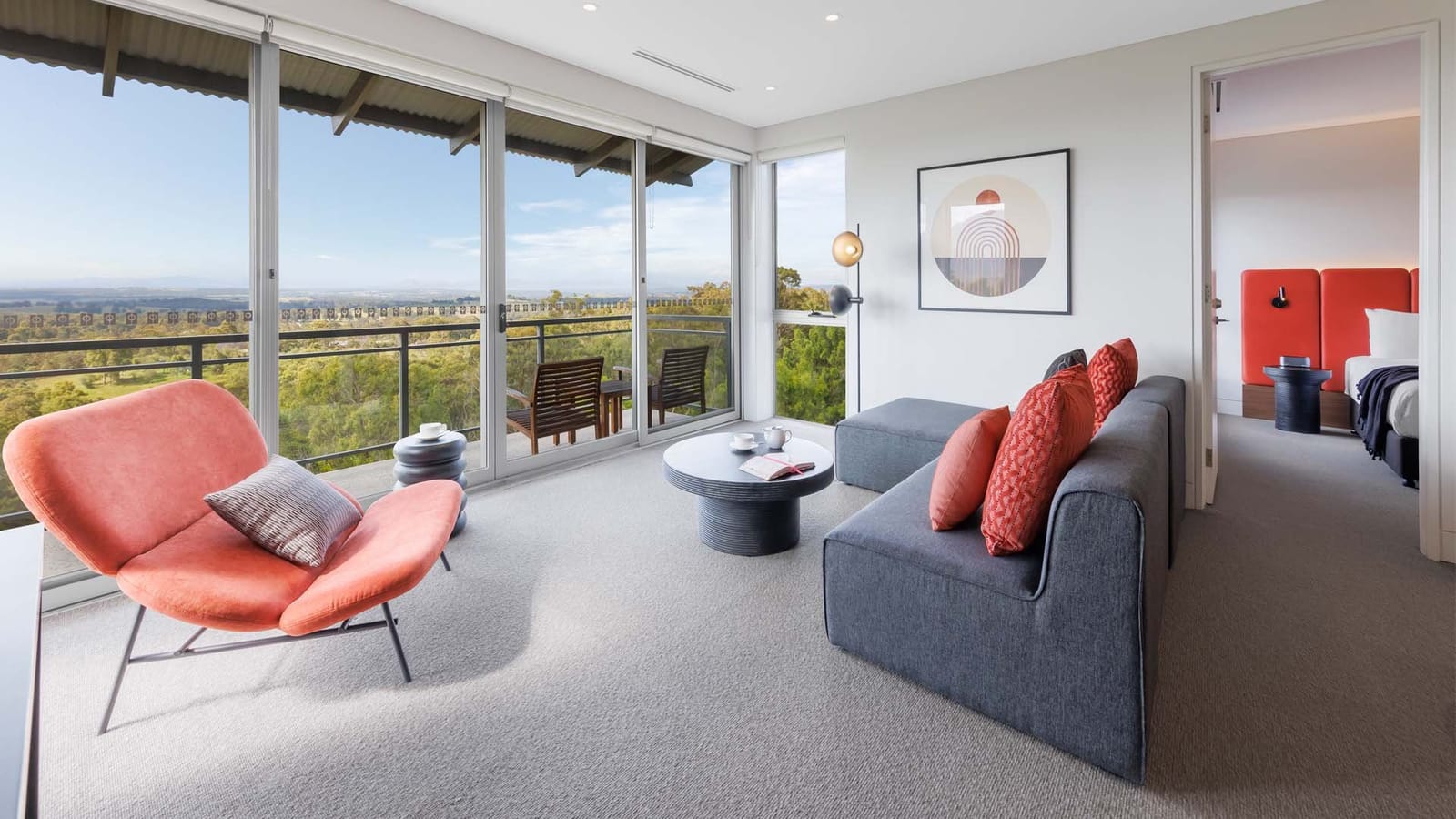 Luxury suite with balcony seating overlooking extensive landscape at Elysia Wellness Retreat, Pokolbin, Hunter Valley