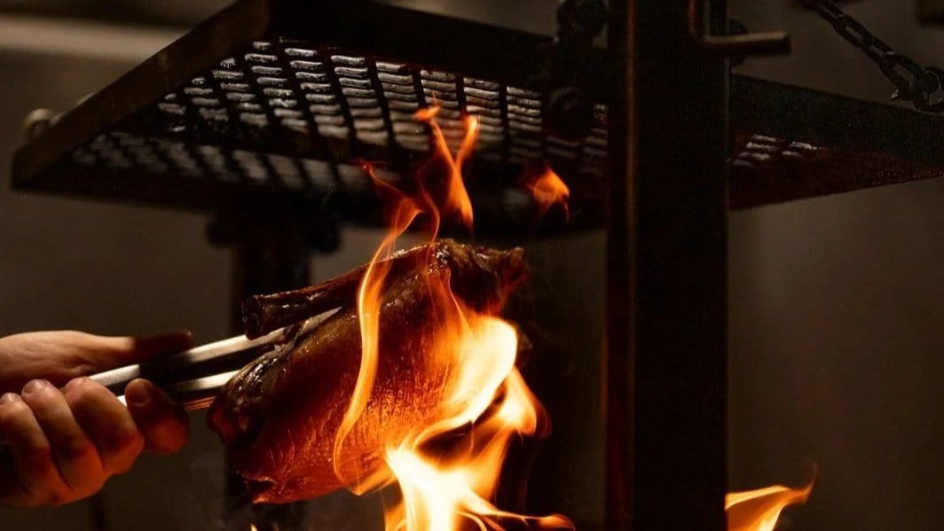 Cooking over open fire in the EXP. kitchen