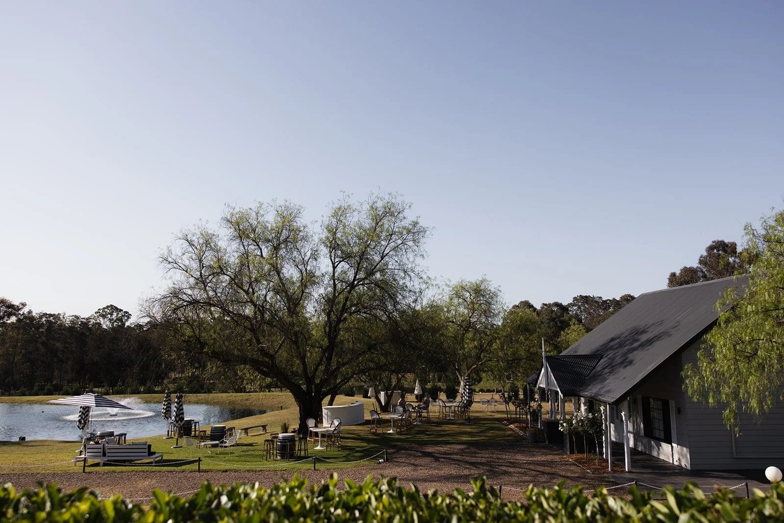 Estate grounds with water feature and mature trees at Greystone Estate, Hunter Valley