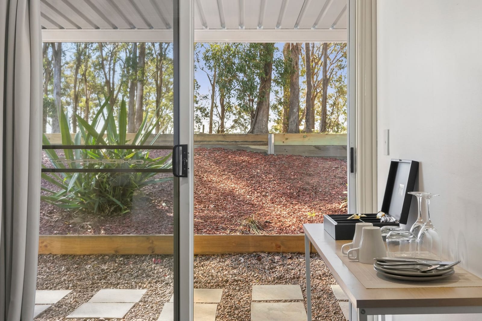 A room with sliding doors onto the garden