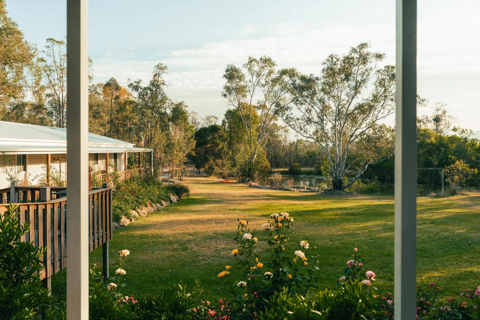 Verandah overlooking lawn and paddocks at Hunter Moon Country House, Broke, Hunter Valley