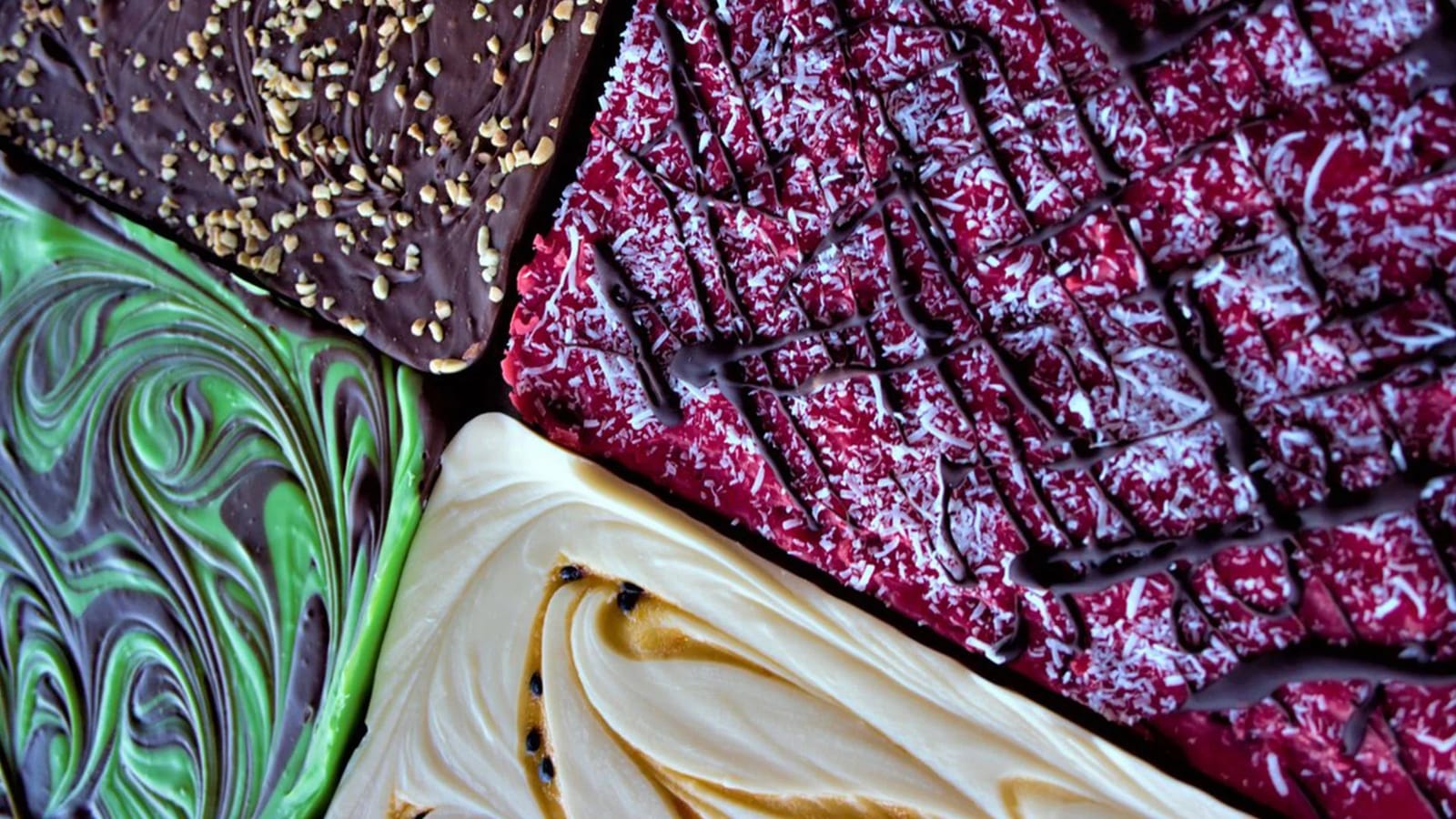 Chocolate creations with gold leaf decoration and coconut coating