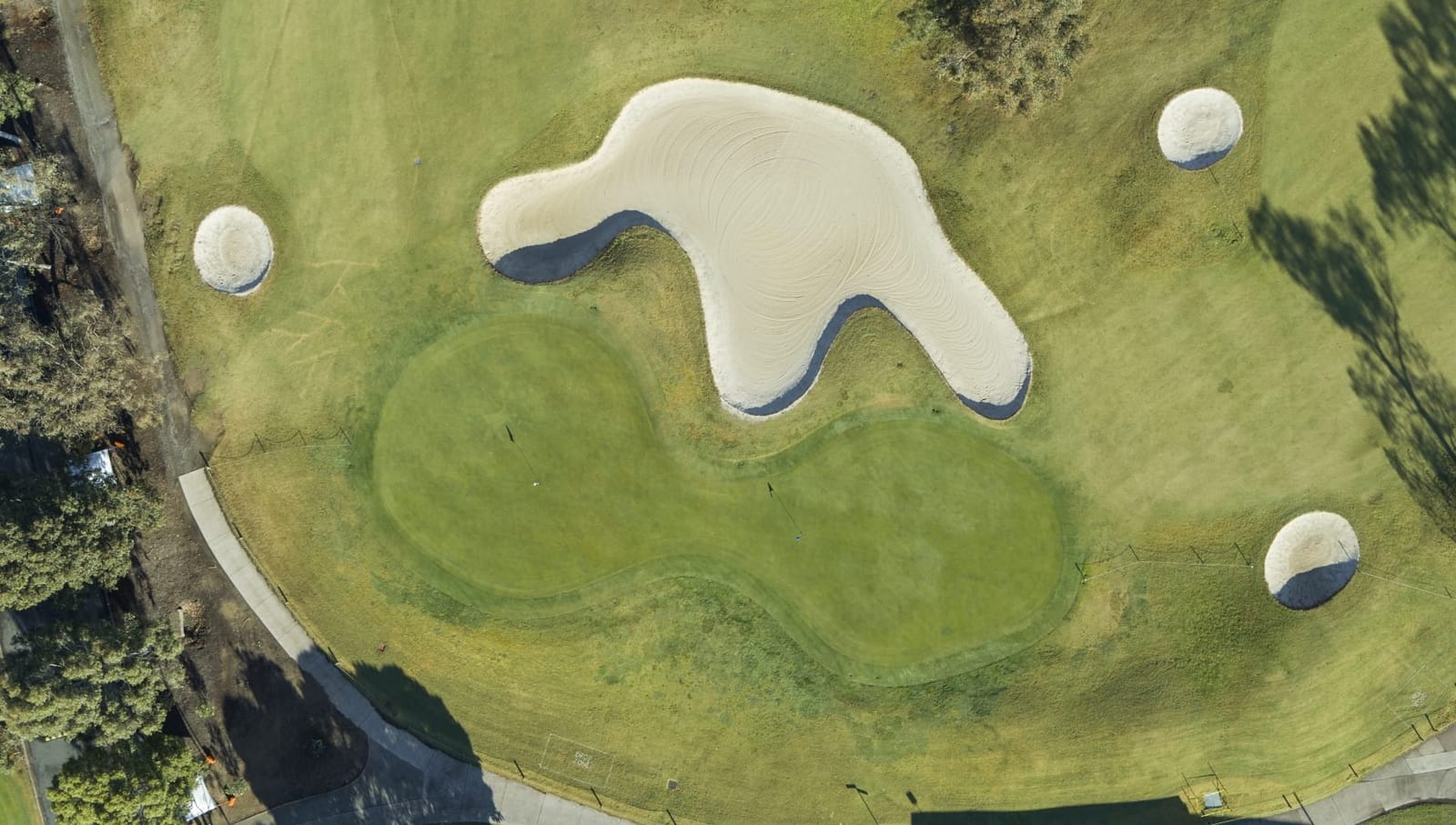 Aerial view of a bunker and green on the course at Hunter Valley Golf Club.