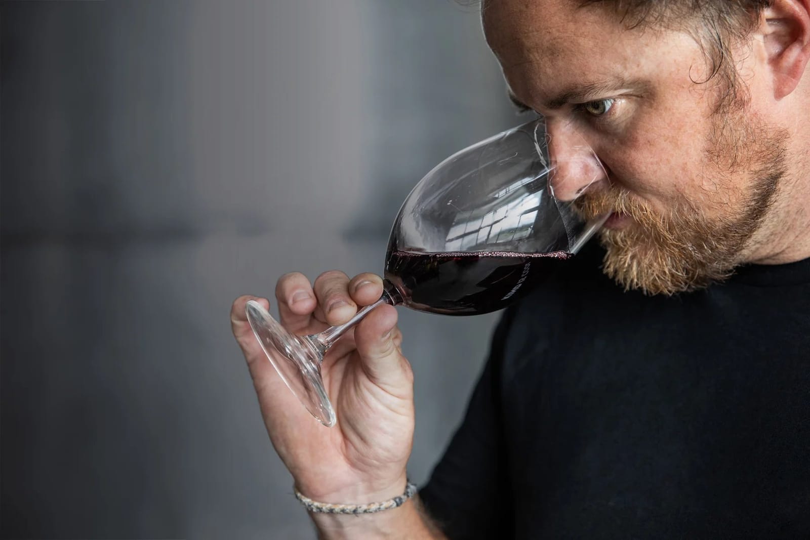 Man tasting red wine at John Wallace, Pokolbin, Hunter Valley