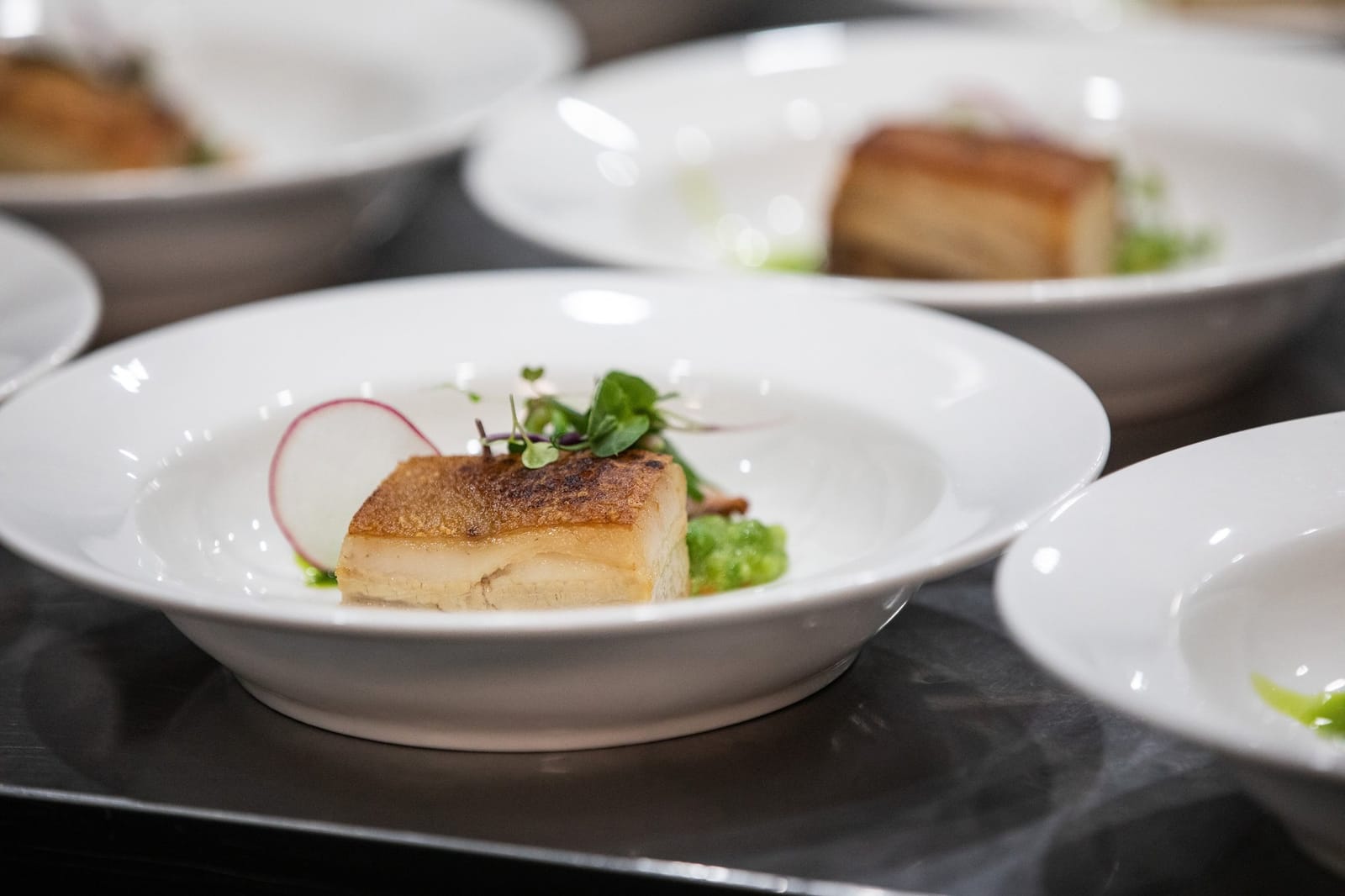 Fine dining plate with seared scallop at Legends Restaurant, Pokolbin, Hunter Valley