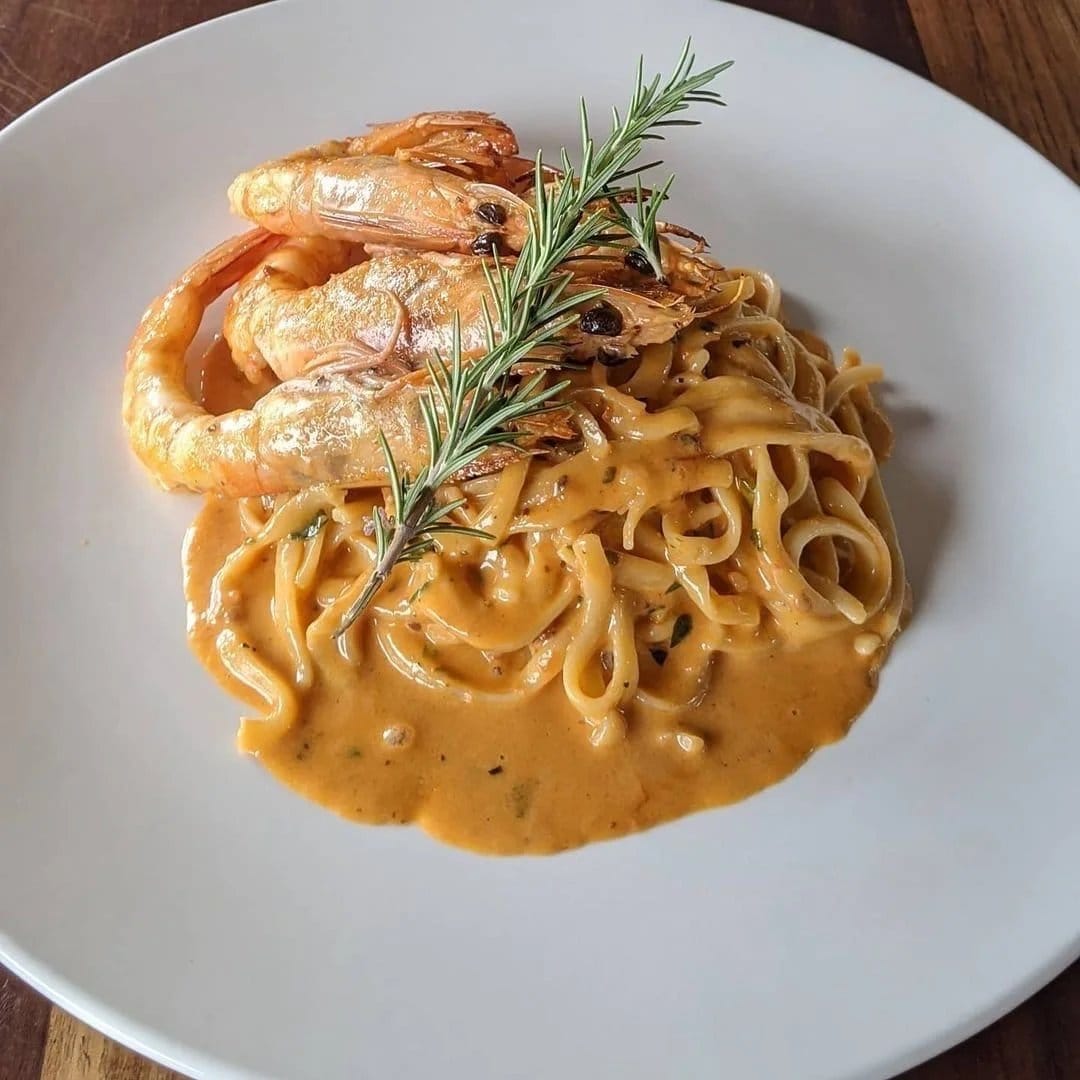 Fettuccine with king prawns in a creamy sauce, garnished with rosemary, at Lillino's Bar and Trattoria