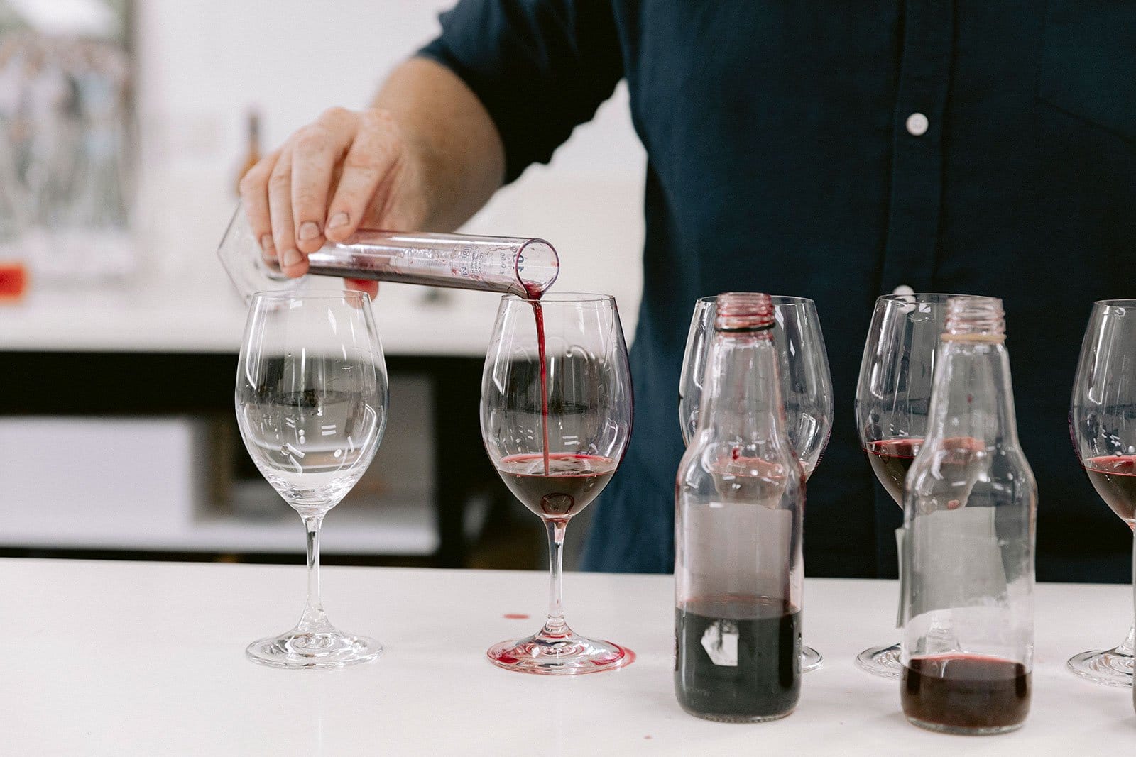 Wine being poured at tasting counter at Mercer, Pokolbin, Hunter Valley