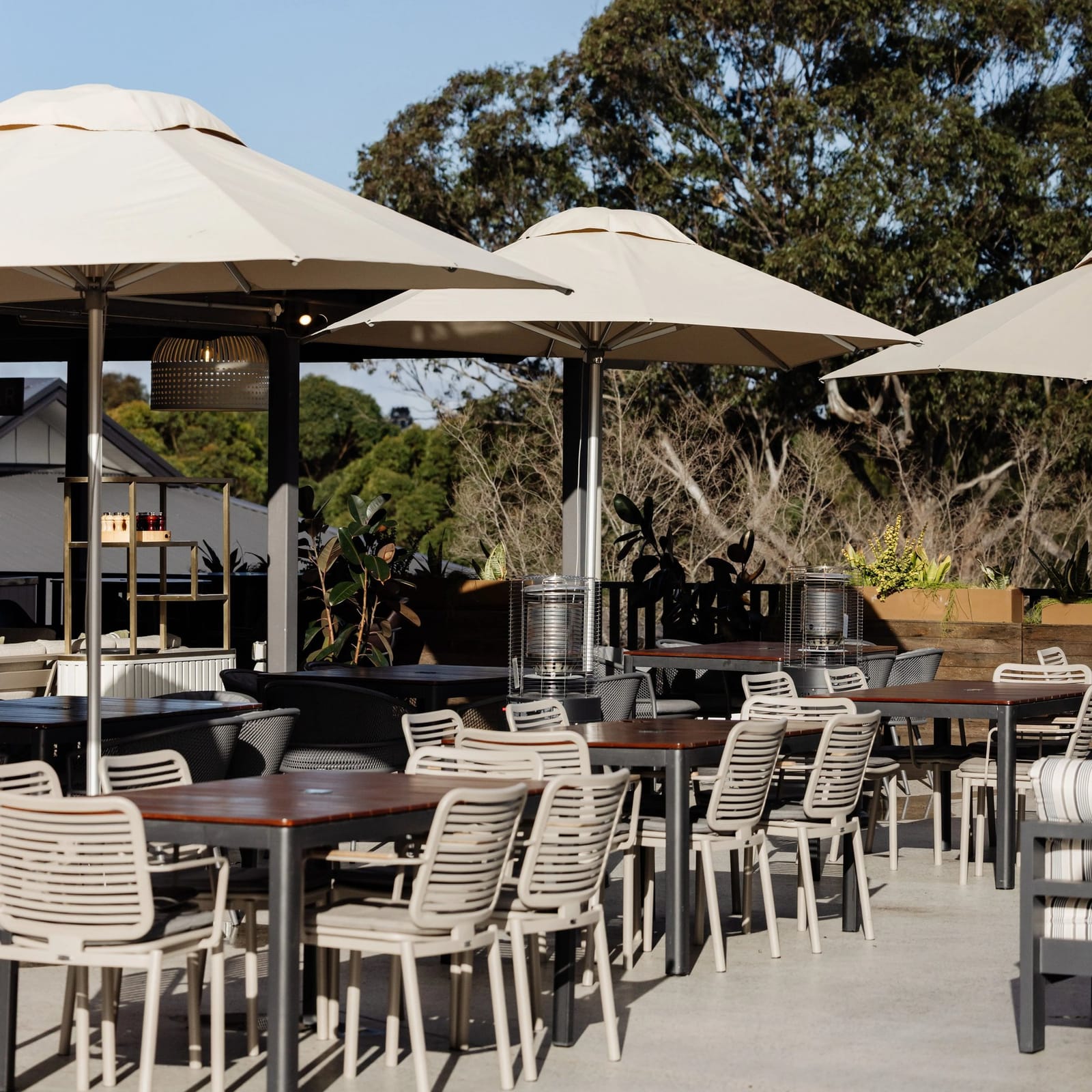 Outdoor terrace with umbrellas and heaters at Mezze Hunter Valley, Pokolbin, Hunter Valley