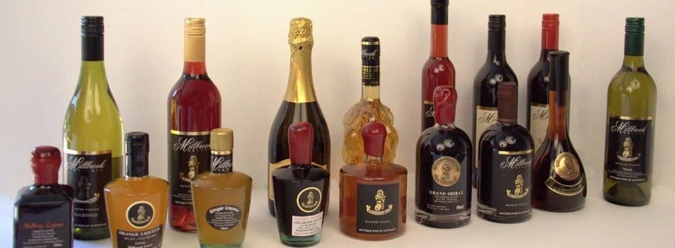 Range of wine bottles with distinct black and gold labels