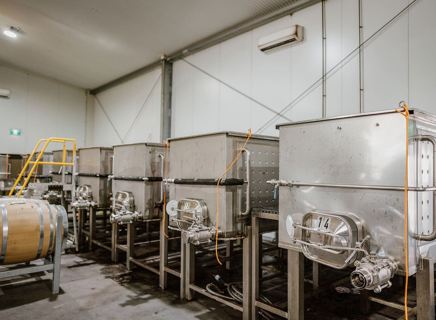 Stainless steel fermentation tanks in production facility