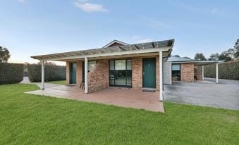One of the brick guest villas at Potters Hotel Brewery Resort