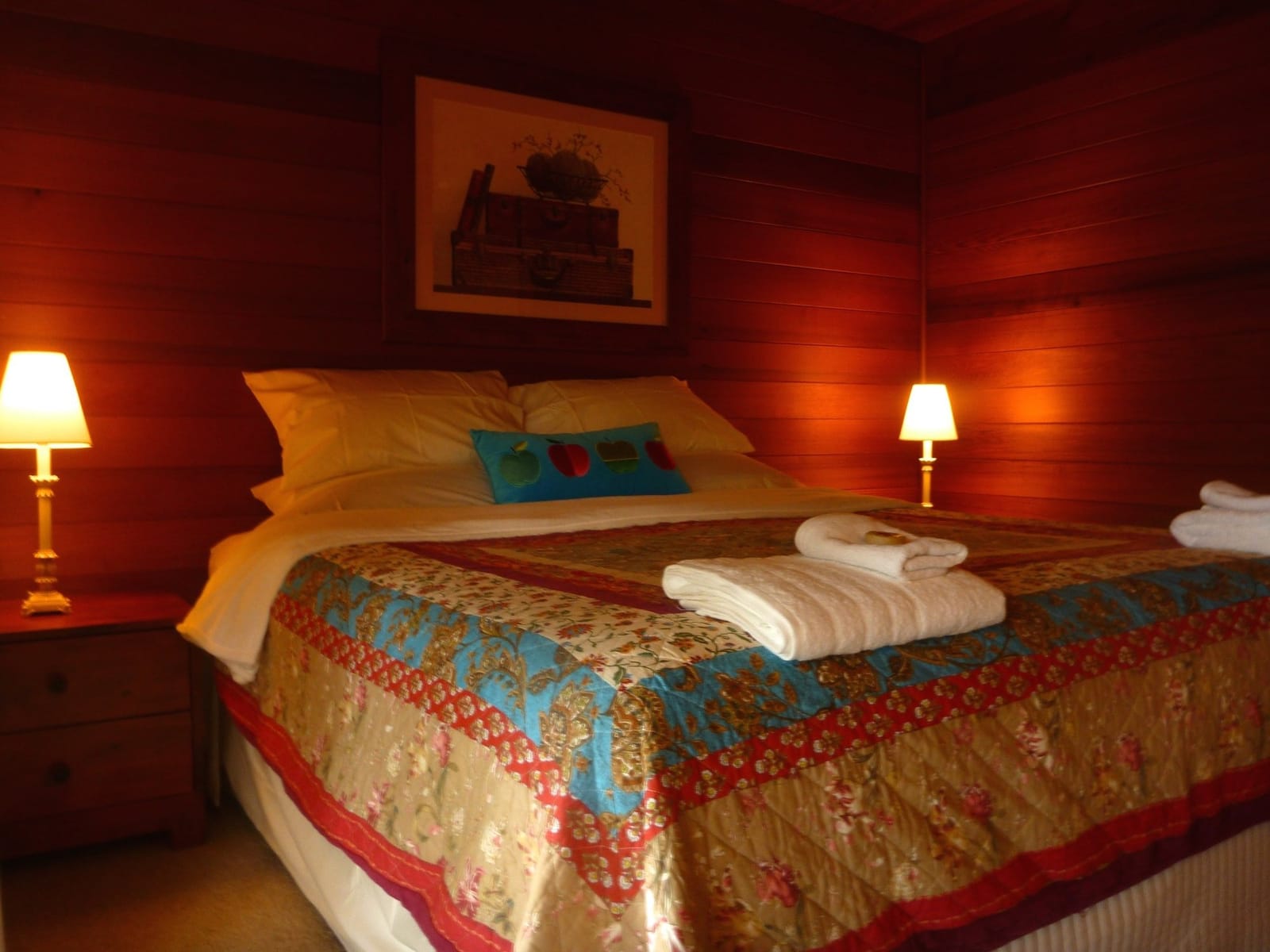A bedroom inside the log cabin