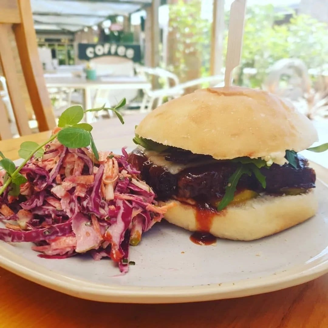 Breakfast spread with berries, granola, avocado toast and eggs Benedict at Simply DVine Cafe, Nulkaba, Hunter Valley