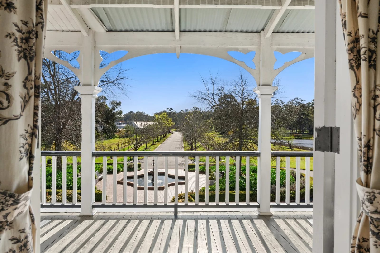 The balcony view from a Deluxe Room over the grounds