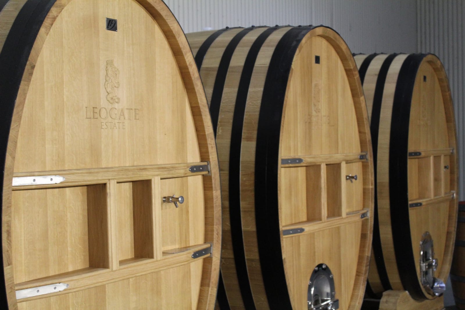 An engraved oak barrel in the Leogate Estate barrel hall