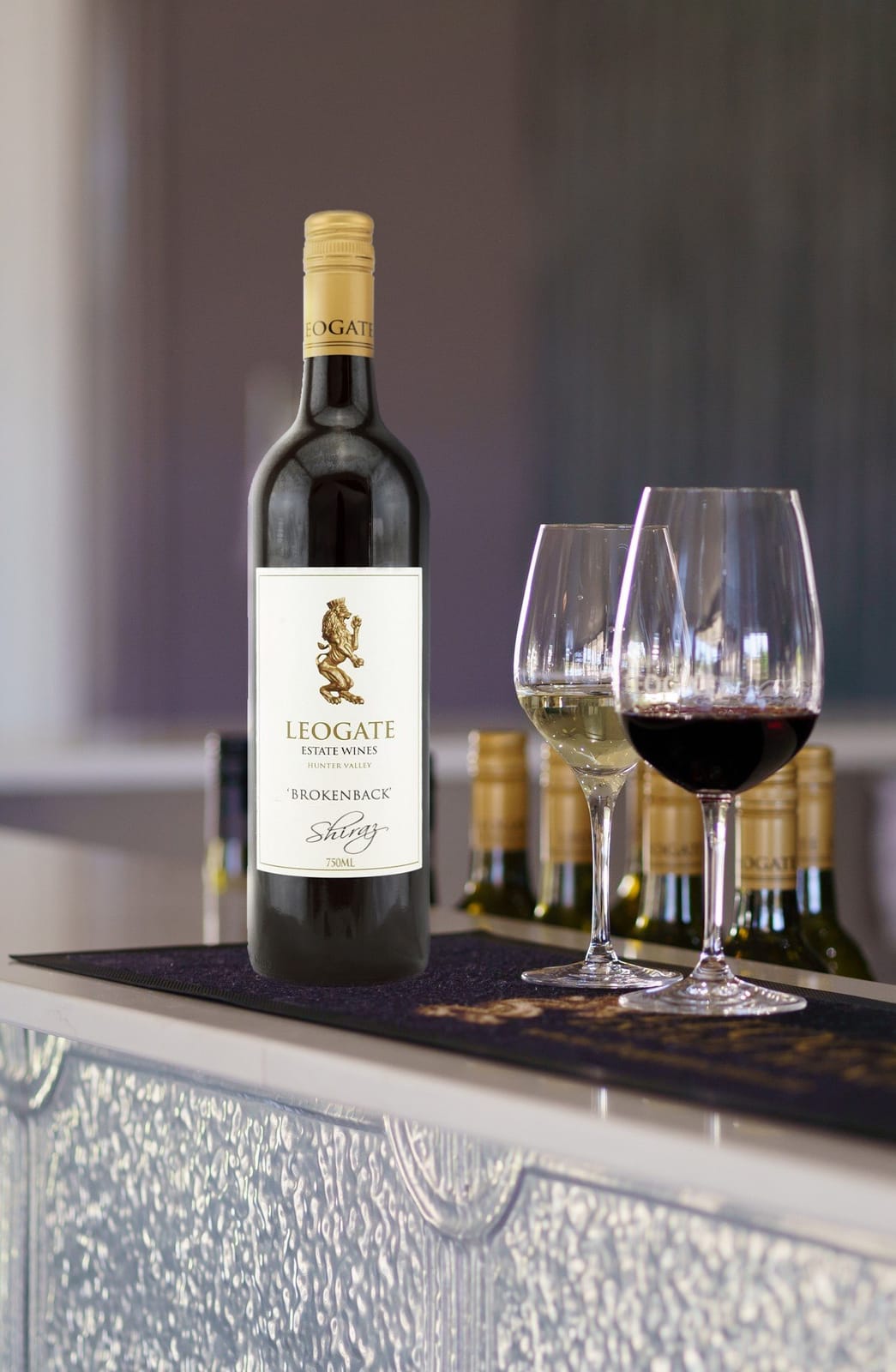 Bottle of Leogate Estate Brokenback Shiraz with poured glasses at The Gates Restaurant, Pokolbin, Hunter Valley