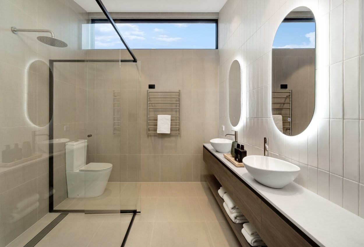 Ensuite bathroom with double vanity and walk-in shower at The Lane Retreat