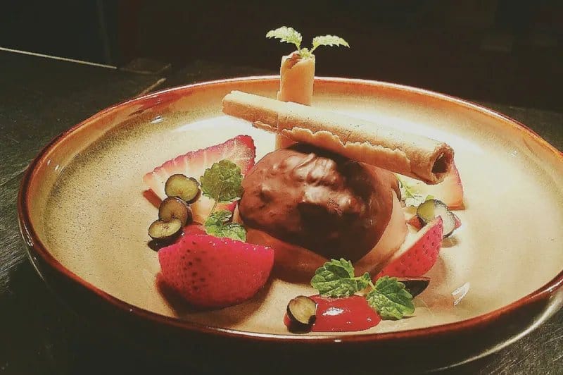 Plated dessert with strawberries and chocolate at The Mill Restaurant, Pokolbin