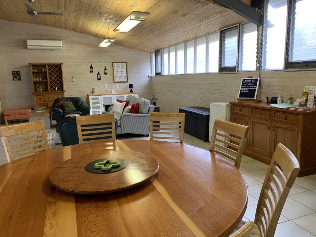 Lodge interior with lounge seating and wine storage