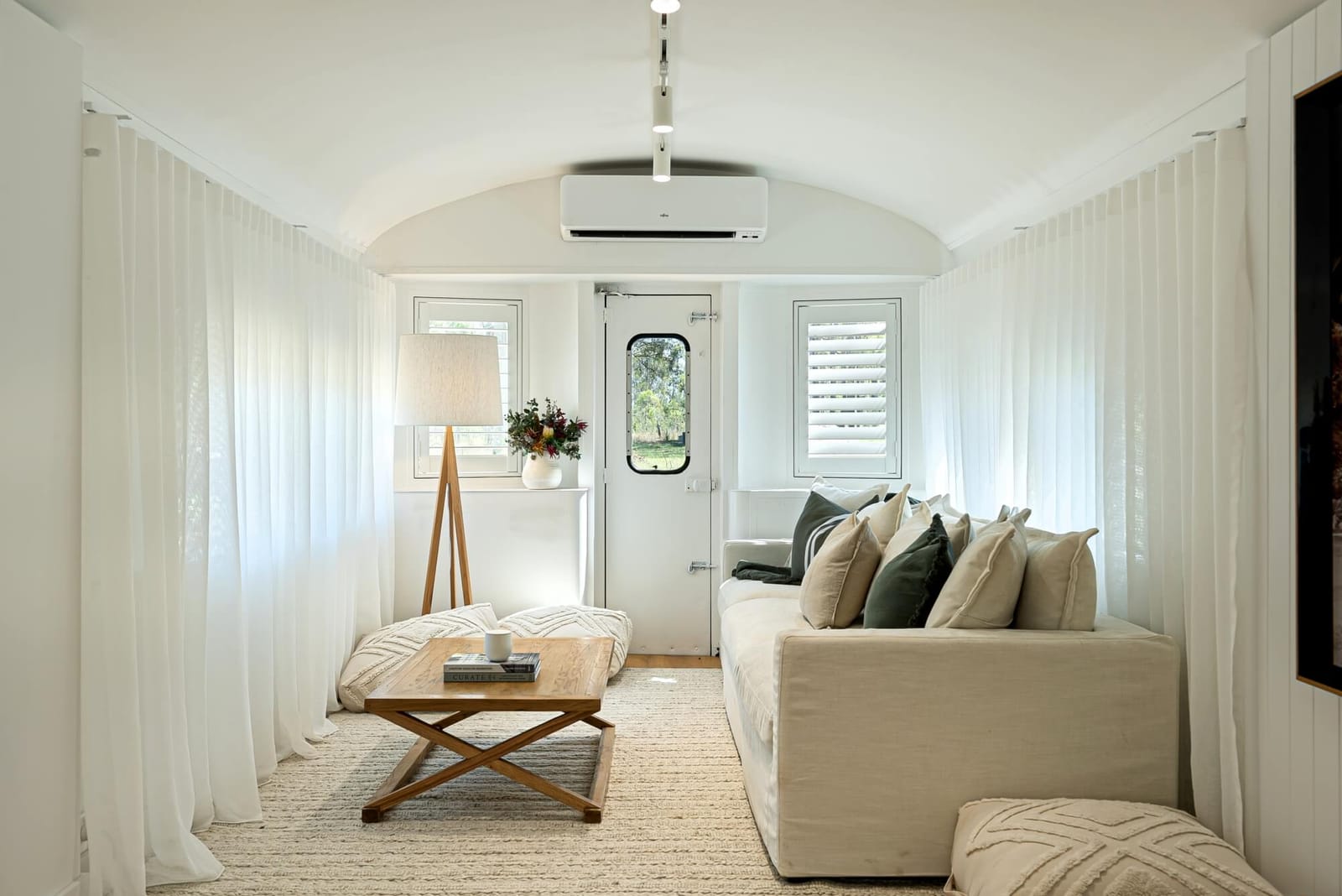 Interior of a train carriage showing elegant design and furnishings