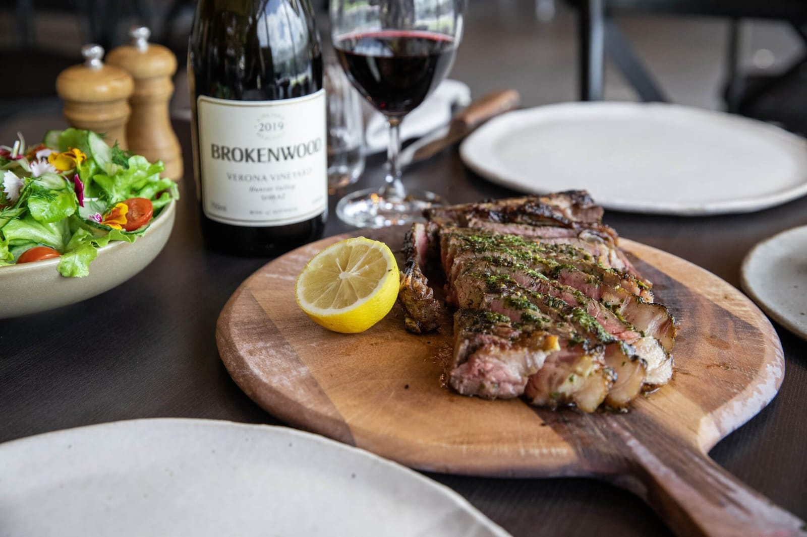 Grilled steak plated with Brokenwood Verona Vineyard Shiraz at The Wood Restaurant and Terrace, Pokolbin, Hunter Valley