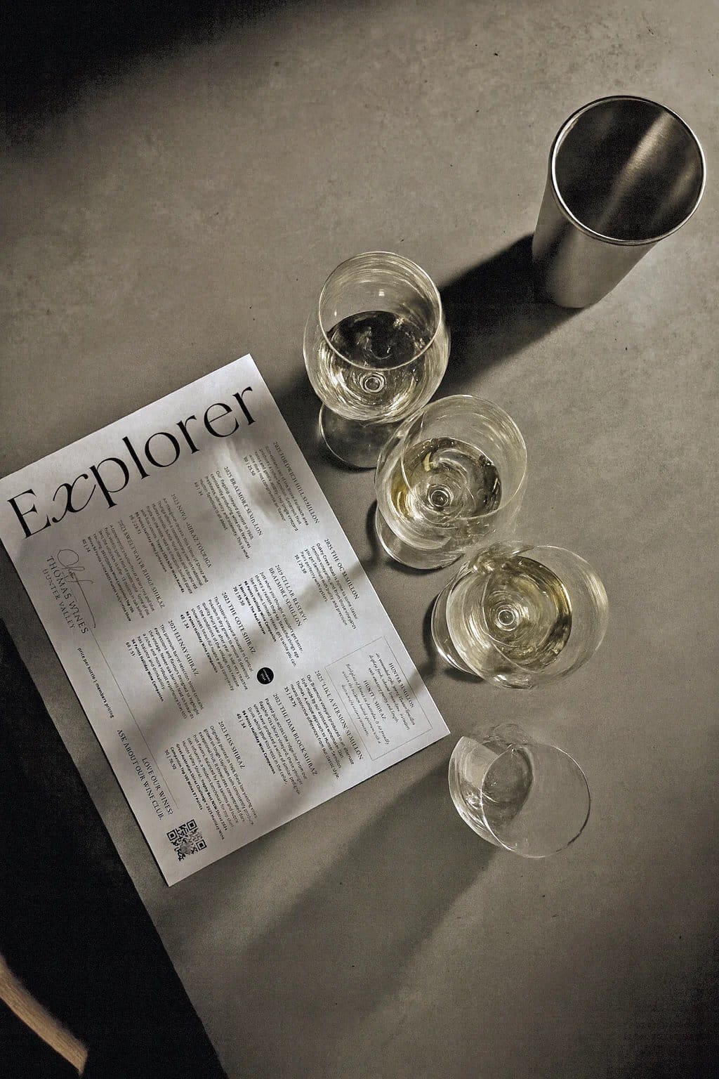 Wine samples in glasses with sediment displayed on guide