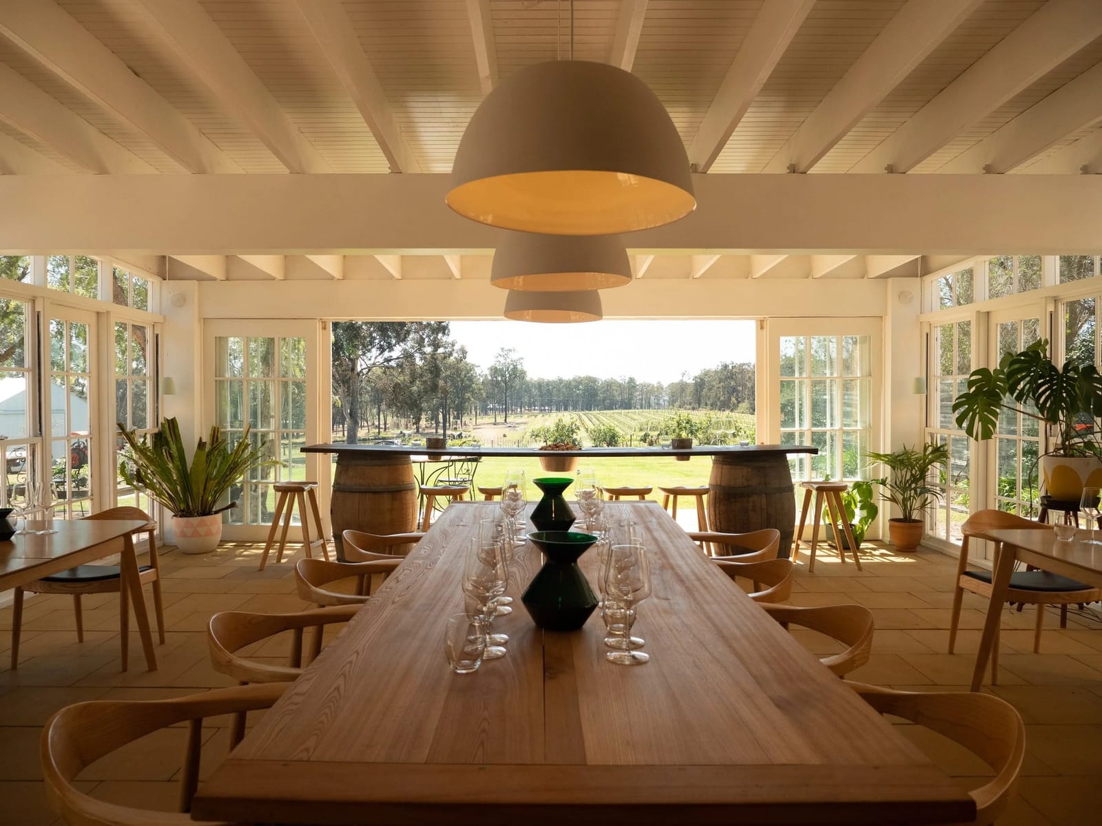 Contemporary low-rise building at dusk with grounds at Vinden, Pokolbin, Hunter Valley