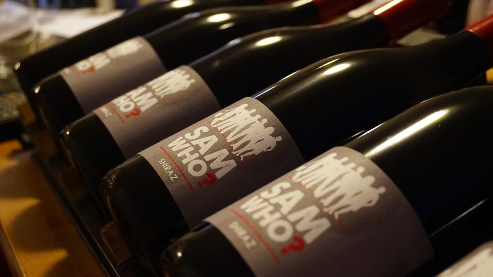 Shiraz wine bottles displayed in a row